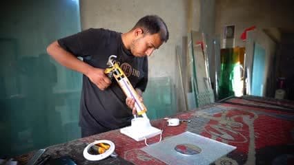 تركيب فتحة تهوية  عىل نافذة زجاج