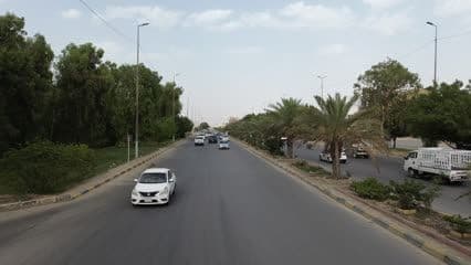 شارع الحزام الاخضر , سيارات , اشجار , حركة امامية